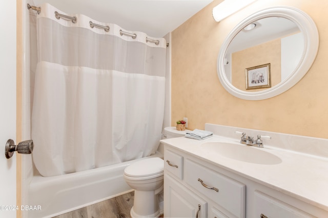 full bathroom with toilet, shower / bath combo, vanity, and hardwood / wood-style floors