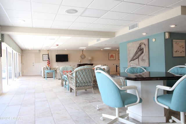 3606 S Peninsula Dr Unit 608, Port Orange, FL 32127 - dining space featuring a paneled ceiling