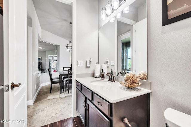 bathroom with vanity, hardwood / wood-style flooring, and toilet