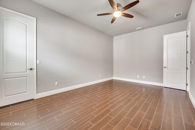 unfurnished room with wood-type flooring and ceiling fan