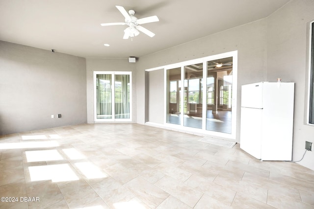 interior space featuring ceiling fan