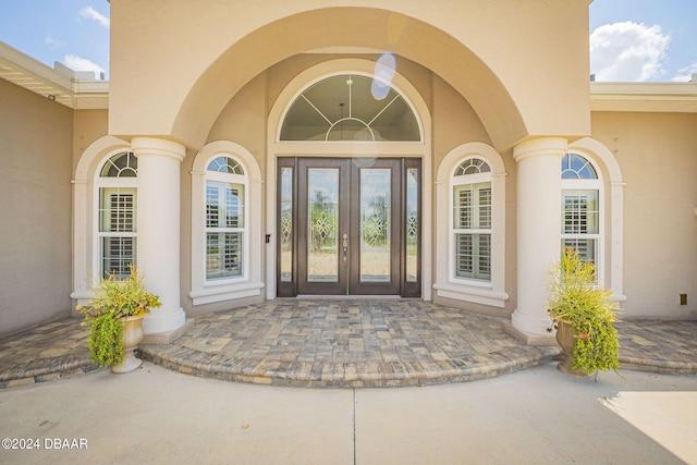 entrance to property featuring french doors