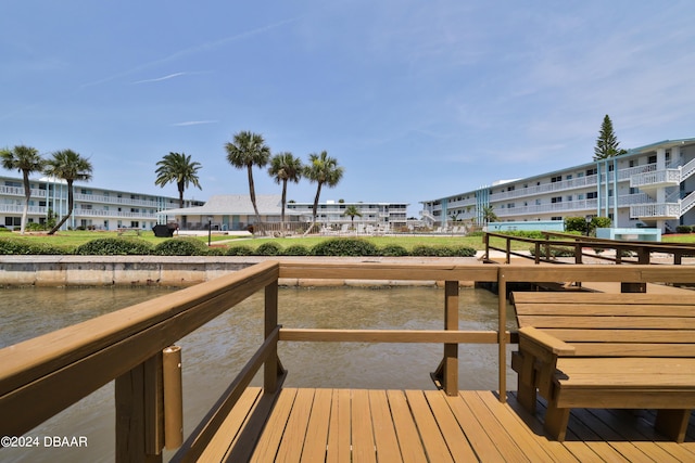 dock area featuring a water view