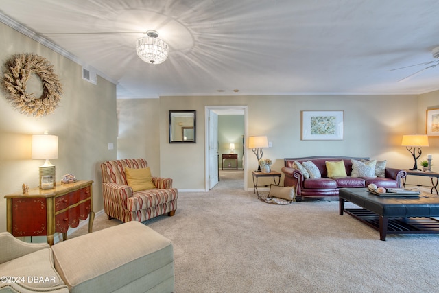 carpeted living room with ornamental molding and ceiling fan with notable chandelier