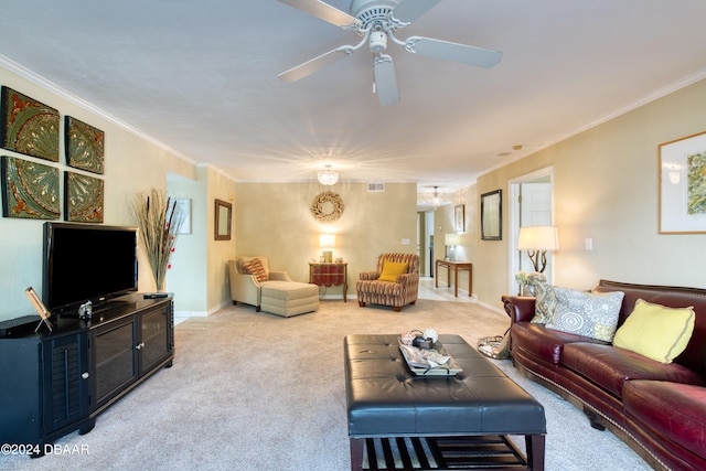 carpeted living room featuring ceiling fan and ornamental molding