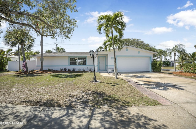 ranch-style home with fence, driveway, stucco siding, a front lawn, and a garage