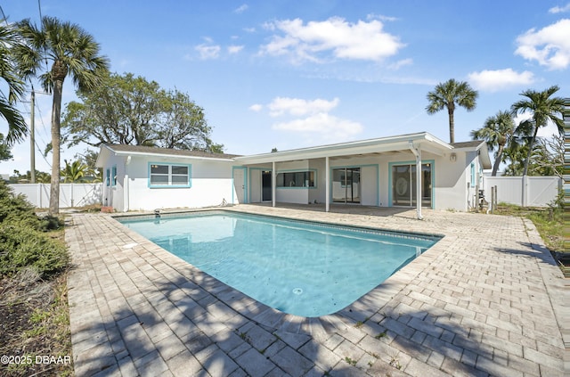 view of swimming pool featuring a gate, a patio area, a fenced in pool, and a fenced backyard