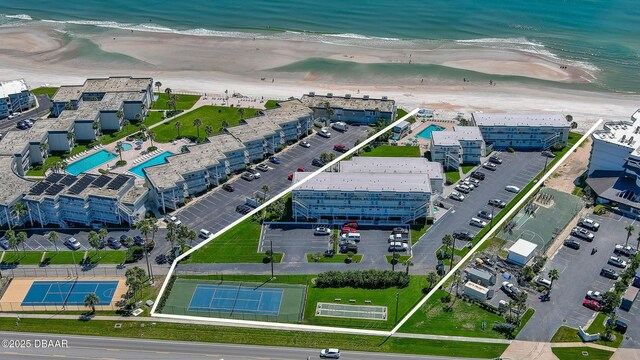 4849 Saxon Dr Unit C202, New Smyrna Beach, FL 32169 - aerial view of expansive beach and a pool