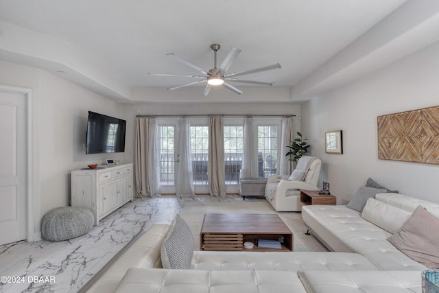 living room featuring ceiling fan