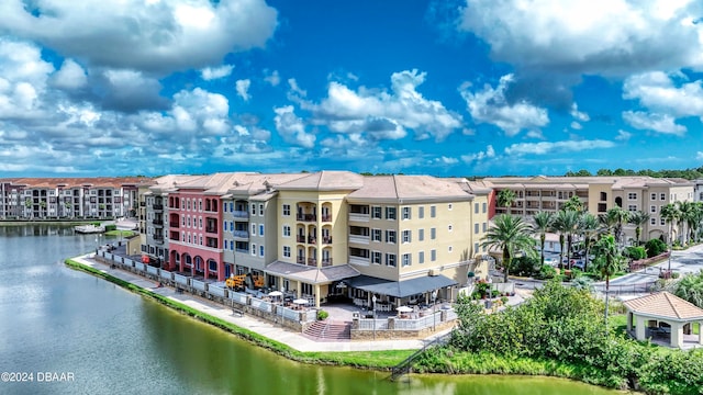 view of building exterior with a water view