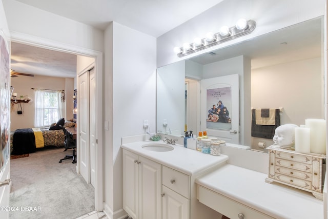 bathroom with vanity and ceiling fan