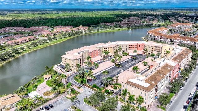 drone / aerial view with a water view