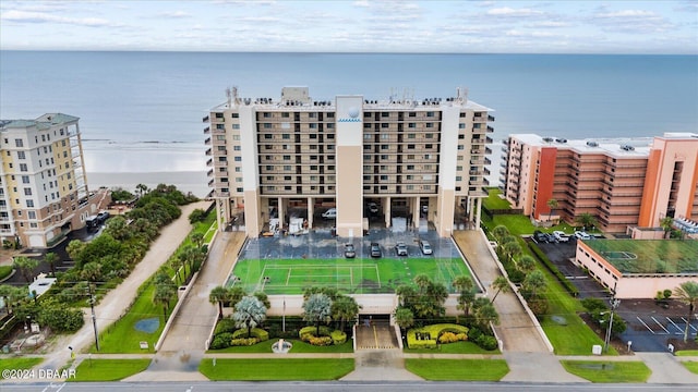 birds eye view of property featuring a water view