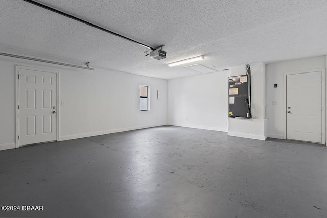 garage with heating unit and a garage door opener