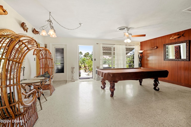 rec room featuring wood walls, pool table, and ceiling fan