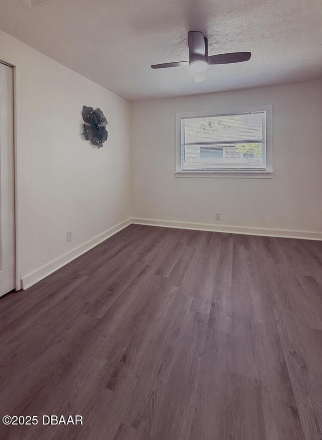 property entrance featuring a yard and a wooden deck