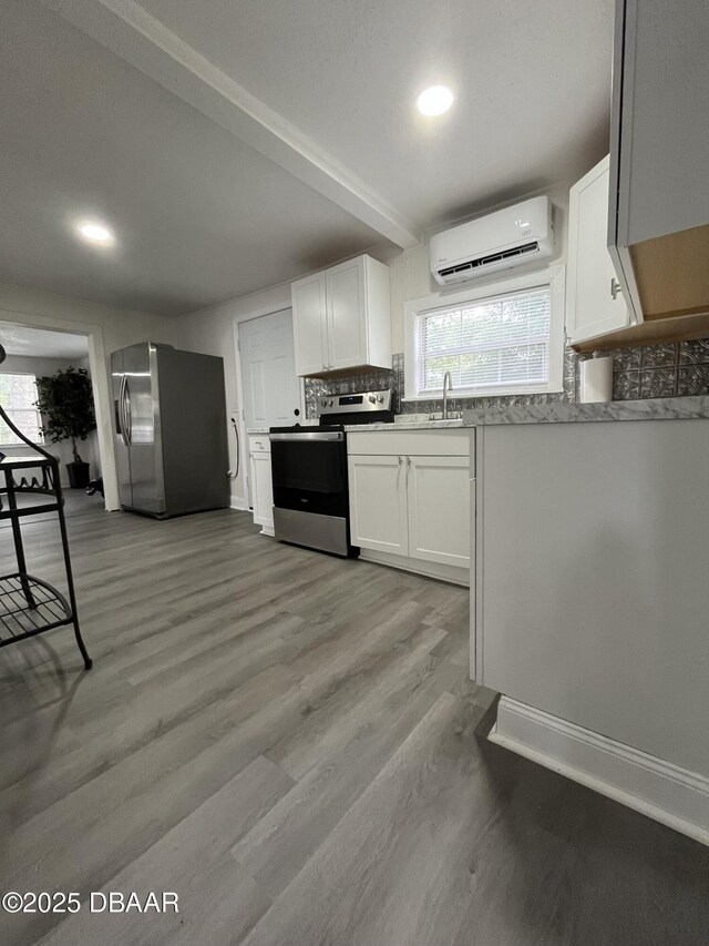 interior space featuring ceiling fan, dark hardwood / wood-style floors, and a closet