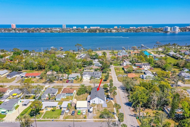 bird's eye view with a water view and a residential view