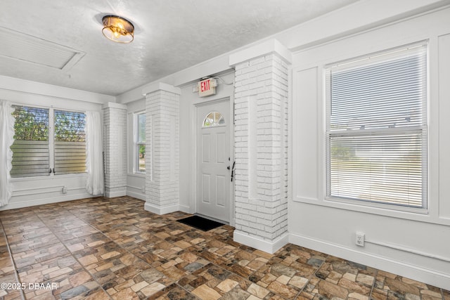 entrance foyer with baseboards