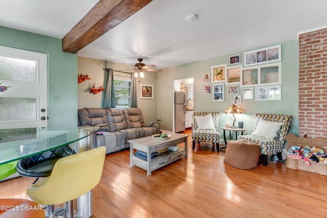 532 Lafayette St, Port Orange, FL 32127 - living area featuring wood finished floors, a ceiling fan, and beamed ceiling