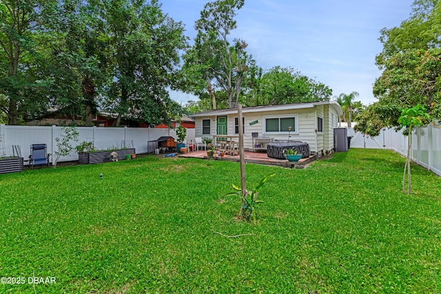 532 Lafayette St, Port Orange, FL 32127 - rear view of property featuring a patio and a hot tub