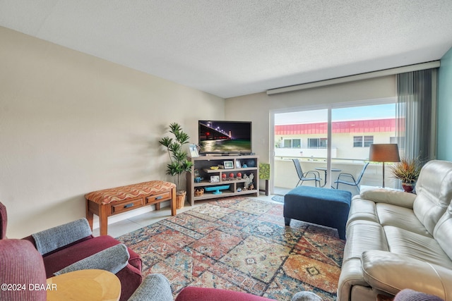 tiled living room with a textured ceiling