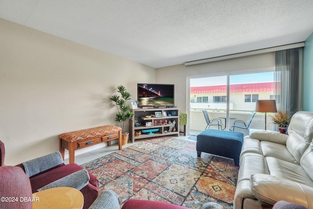 2901 N Halifax Ave Unit 218, Daytona Beach, FL 32118 - living area featuring a textured ceiling