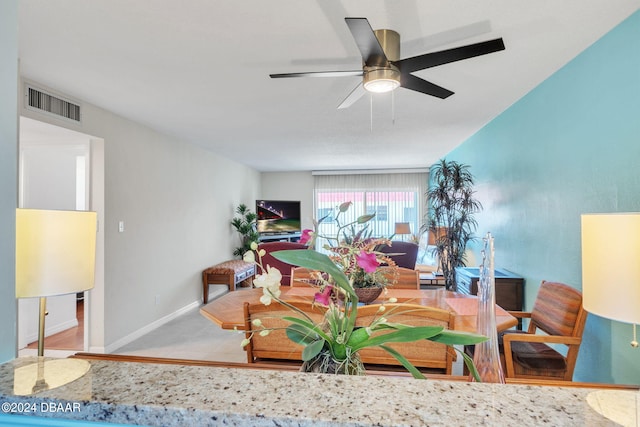 dining area featuring ceiling fan and light hardwood / wood-style floors