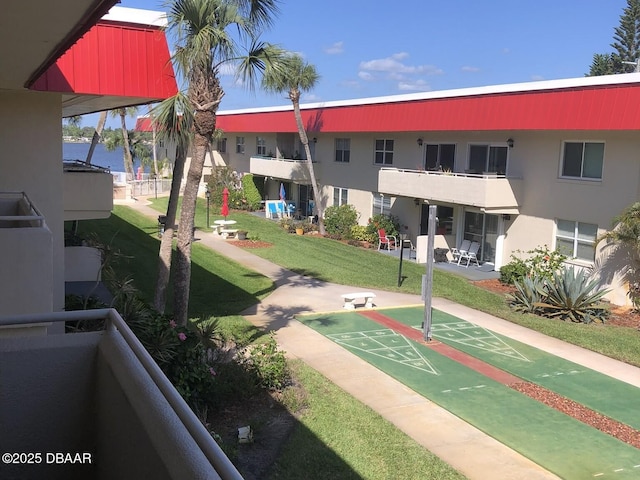 2901 N Halifax Ave Unit 218, Daytona Beach, FL 32118 - surrounding community featuring shuffleboard and a lawn