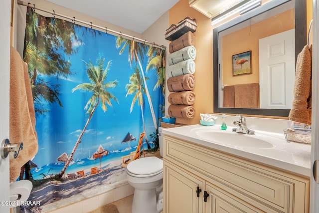 bathroom featuring a shower with shower curtain, tile patterned floors, vanity, and toilet