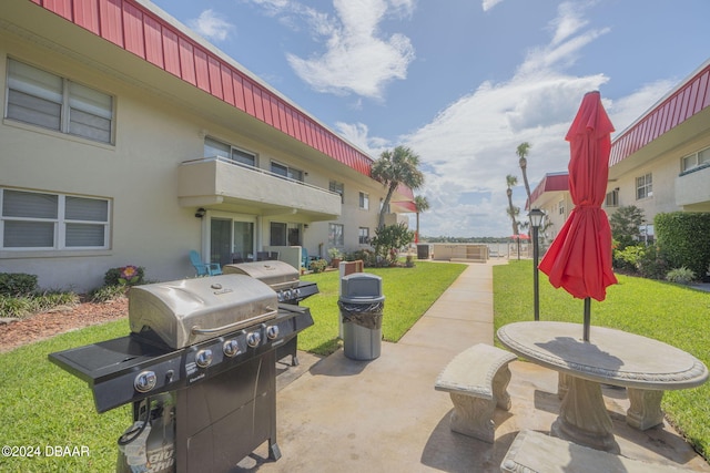 view of patio with a grill