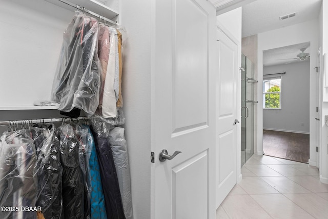 562 Landshark Blvd, Daytona Beach, FL 32124 - walk in closet with light tile patterned flooring and a ceiling fan