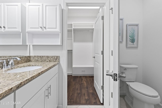 562 Landshark Blvd, Daytona Beach, FL 32124 - bathroom with vanity and wood finished floors