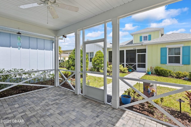 562 Landshark Blvd, Daytona Beach, FL 32124 - unfurnished sunroom featuring ceiling fan