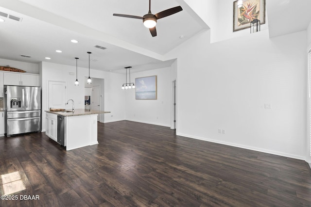 562 Landshark Blvd, Daytona Beach, FL 32124 - kitchen with stainless steel appliances, recessed lighting, a ceiling fan, dark wood finished floors, and white cabinets