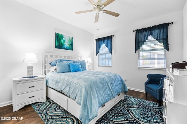 562 Landshark Blvd, Daytona Beach, FL 32124 - bedroom with dark wood-type flooring, baseboards, and ceiling fan