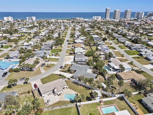 aerial view with a water view and a city view