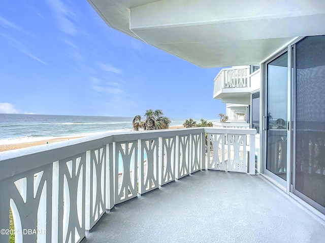 1133 Ocean Shore Blvd Unit 202, Ormond Beach, FL 32176 - balcony featuring view of water and beach