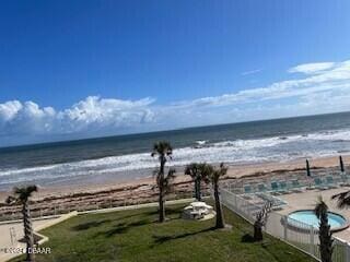 property view of water featuring a beach view