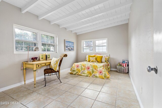 tiled bedroom featuring lofted ceiling with beams and wood ceiling