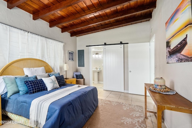 tiled bedroom with ensuite bath, beam ceiling, a barn door, wooden ceiling, and electric panel