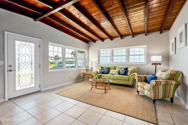 tiled living room featuring vaulted ceiling with beams and wood ceiling