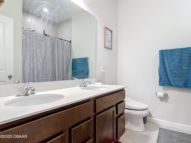 full bathroom with tile patterned floors, toilet, baseboards, and a sink