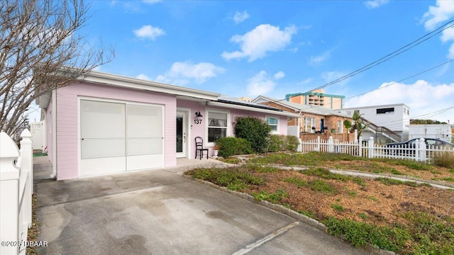 ranch-style home with a garage