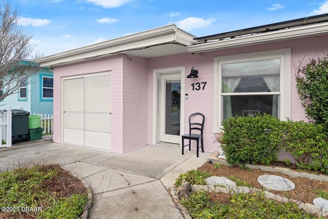 doorway to property with a patio