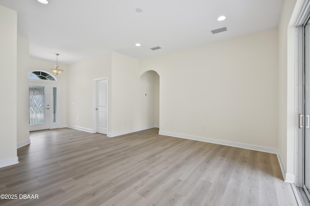 empty room featuring light hardwood / wood-style floors