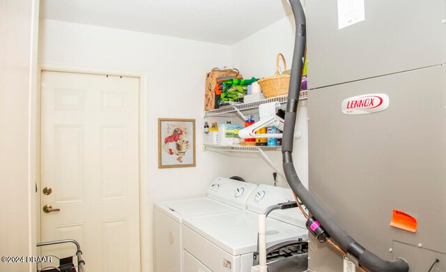 washroom with washing machine and dryer