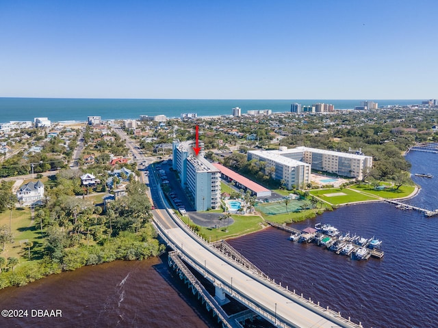 drone / aerial view with a water view