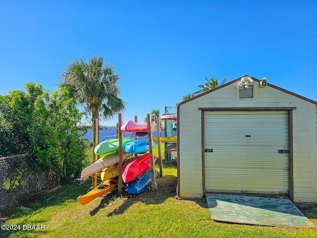 garage with a lawn