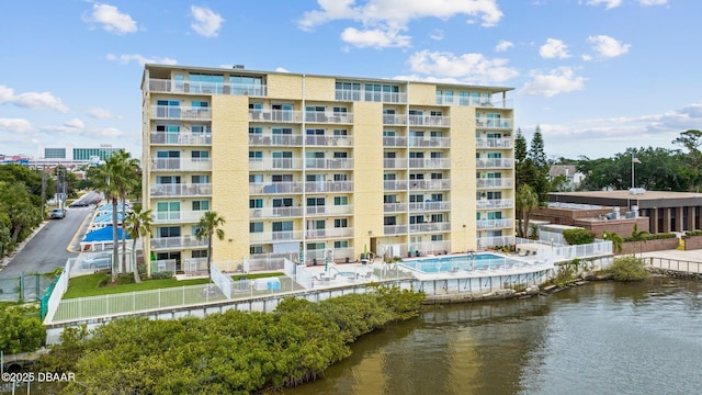 view of building exterior featuring a water view